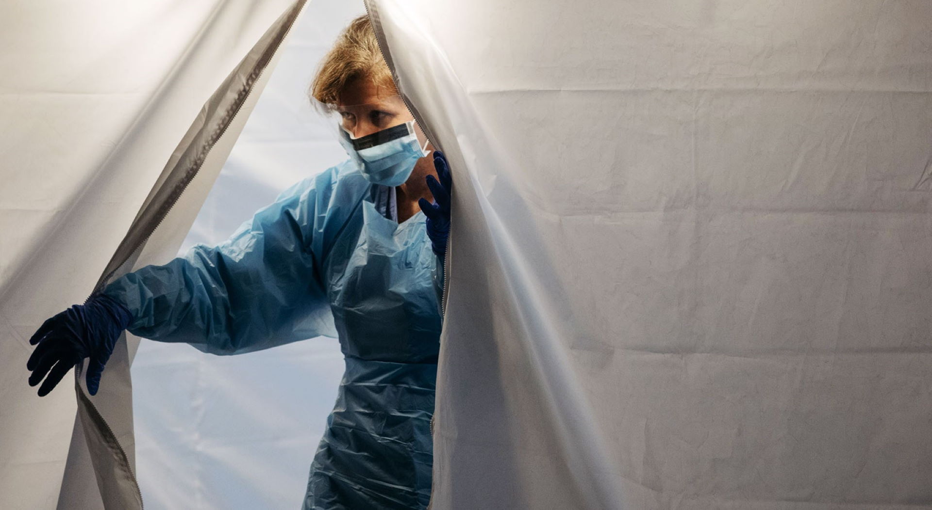 Nurse Entering Covid-19 Testing Tent ezCovid